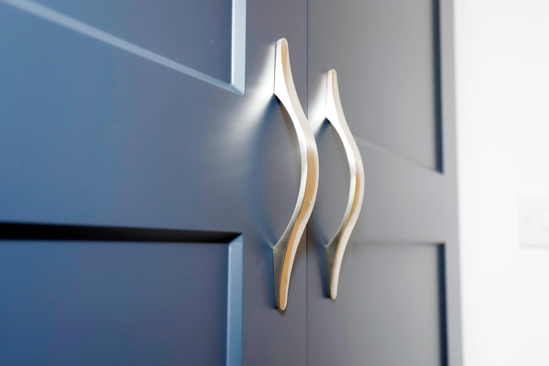 Indigo-blue-wardrobe-with-brushed-nickel-handle